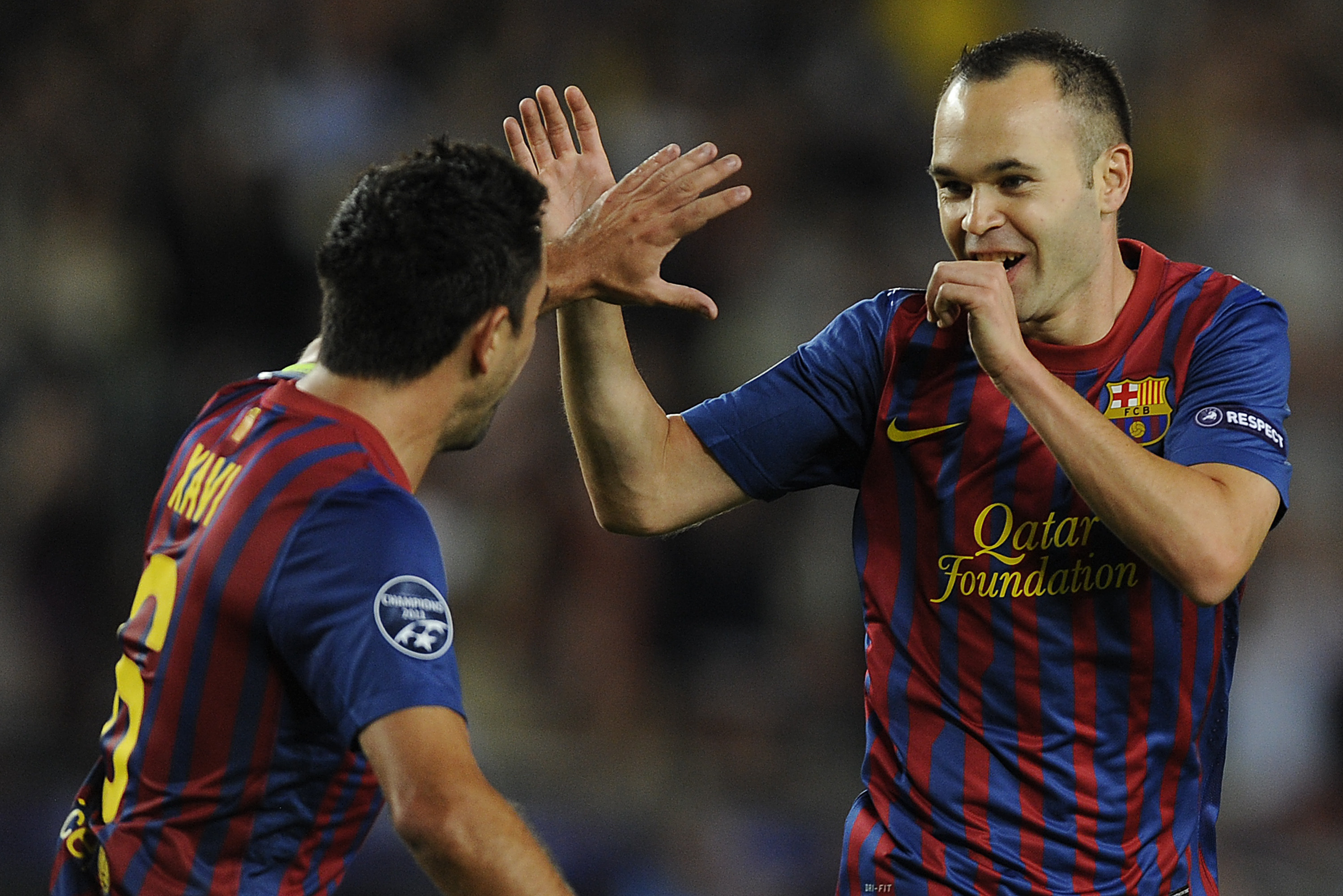 Barca's Xavi and Iniesta